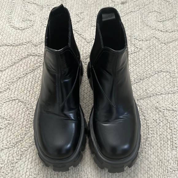 Prada Monolith Leather Lug-Sole Chelsea Booties - Picture 2 of 8